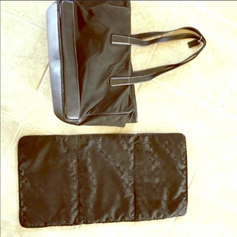 Coach diaper bag with changing pad